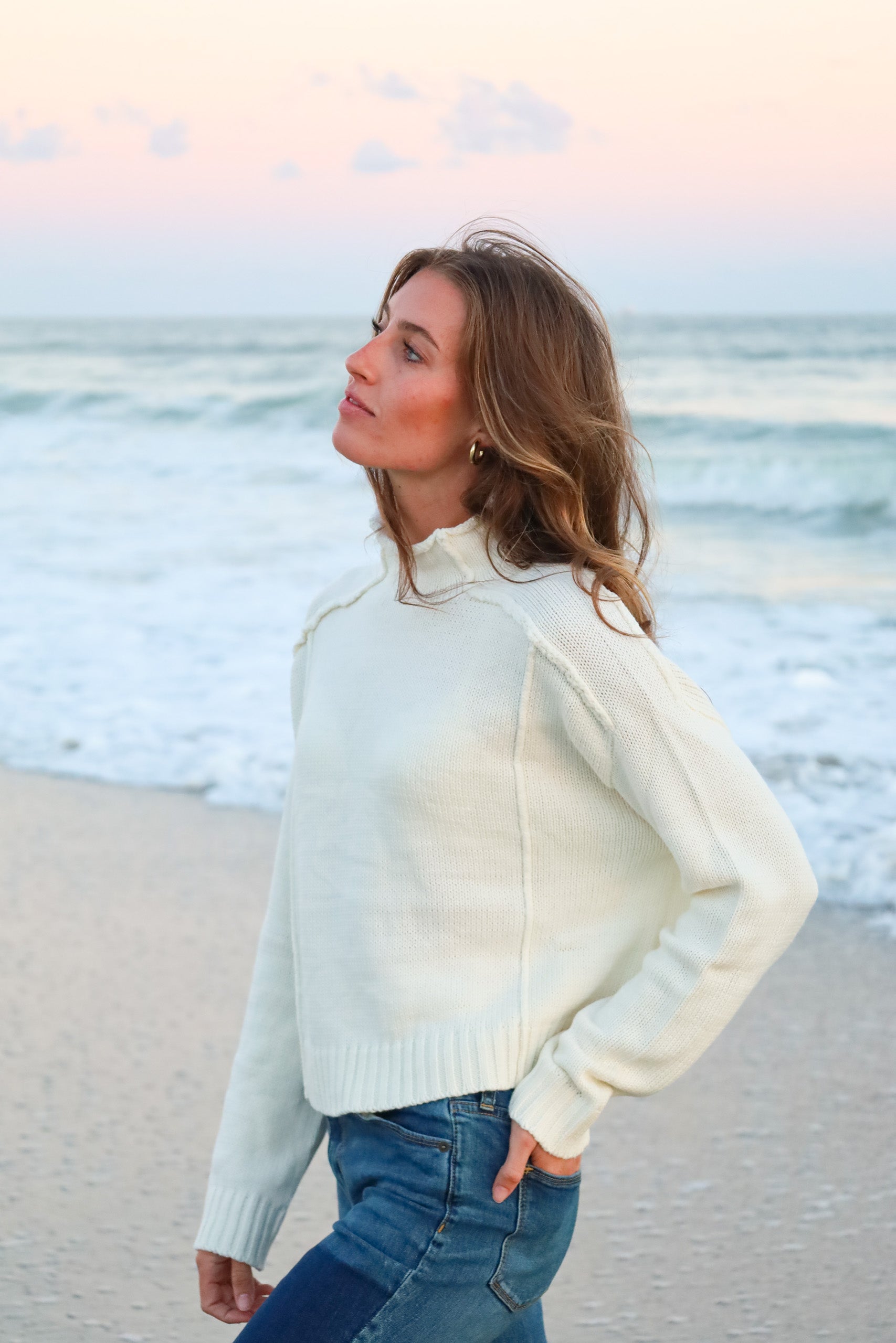 White timeless roll neck sweater