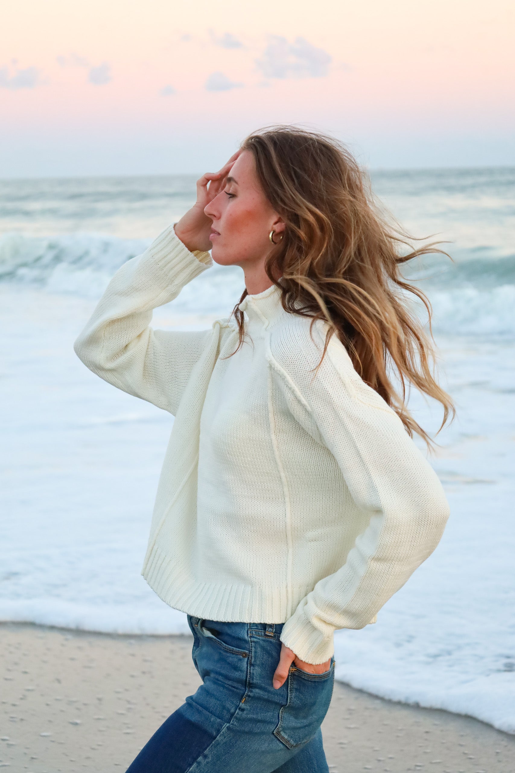 White timeless roll neck sweater