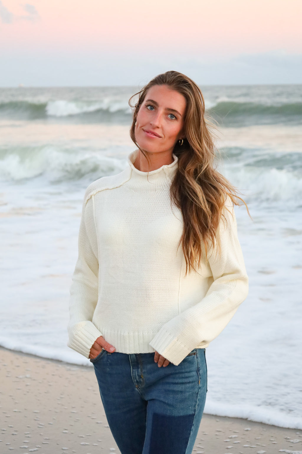 White timeless roll neck sweater